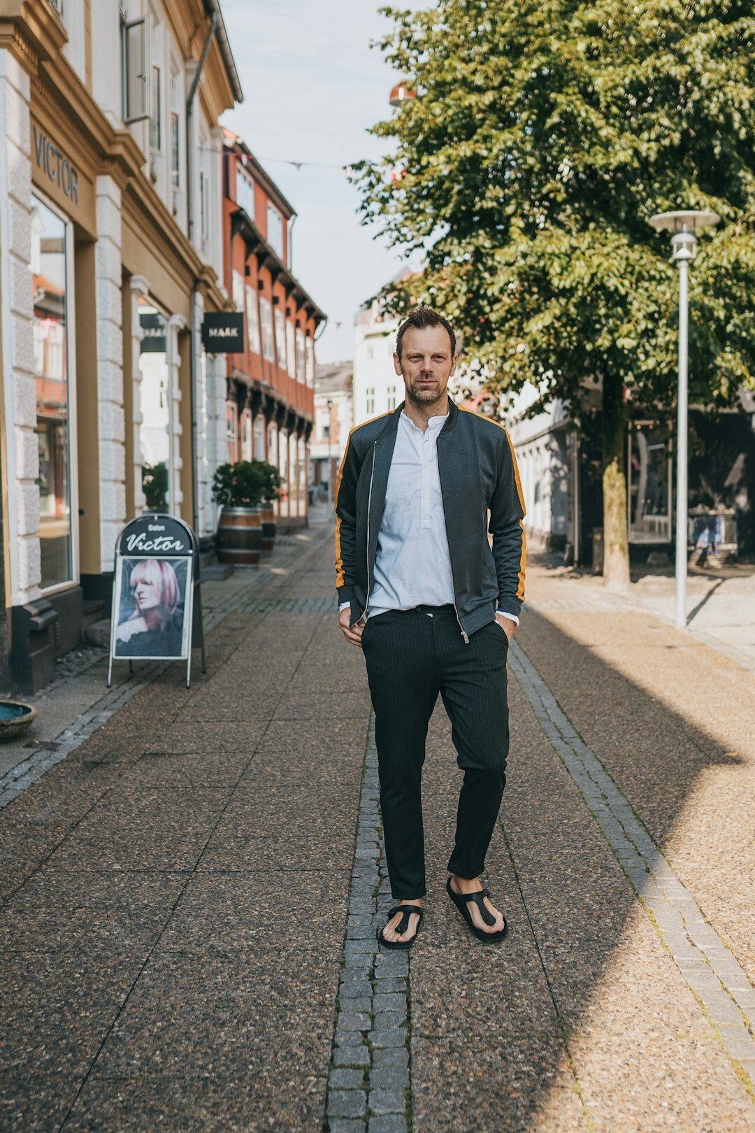 Portrait of a Finnish man in his 40s, company founder, in business casual attire