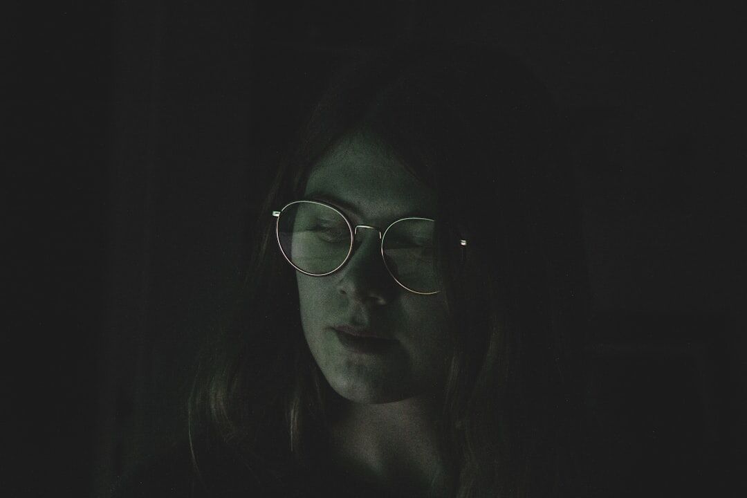 Portrait of a Finnish woman in her 30s, technical director, wearing glasses
